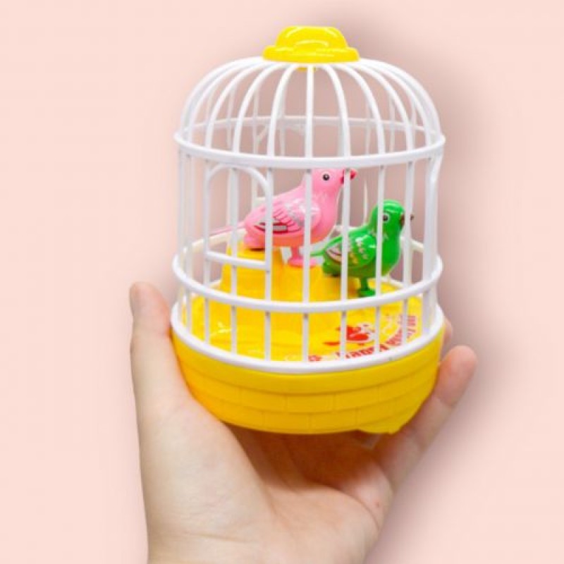 Іграшка на батарейках "Пташки в клітці" (жовтий), вид 4 Пластик Різнобарв'я (240824)
