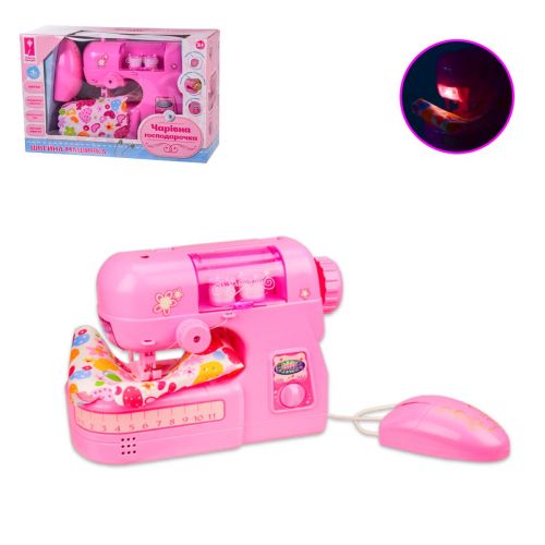 Швейна машина "Чарівна господарочка", світло, звук Пластик Рожевий (213928)