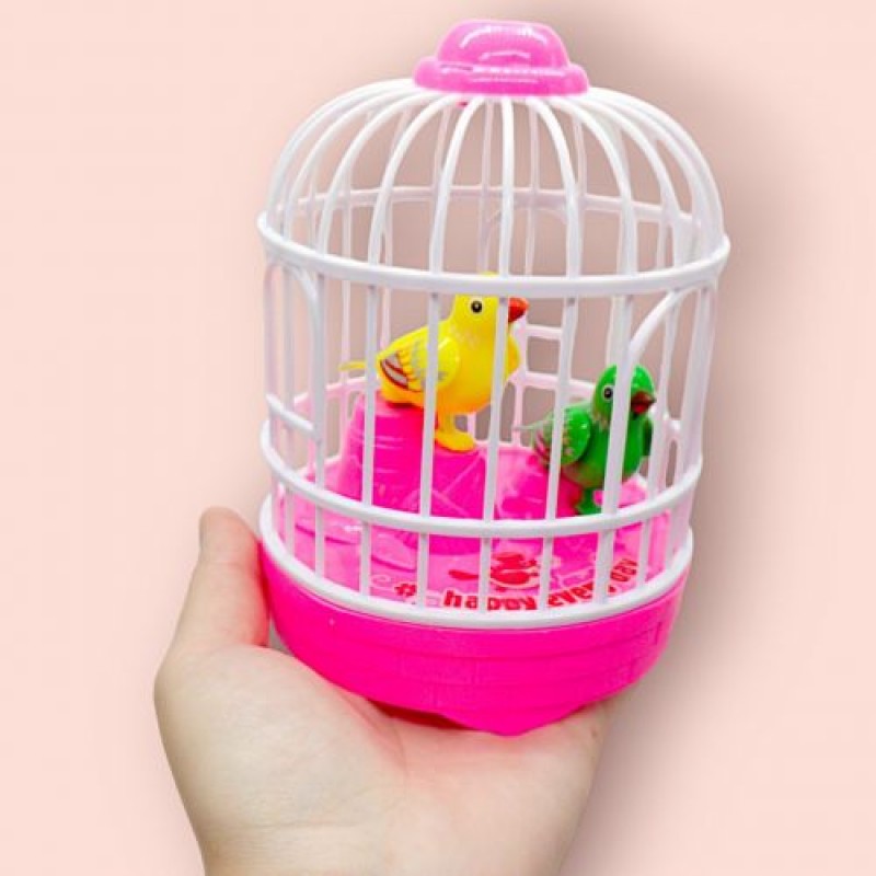 Іграшка на батарейках "Пташки в клітці" (рожевий), вид 4 Пластик Різнобарв'я (240821)