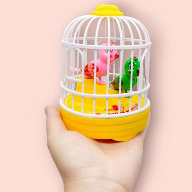 Іграшка на батарейках "Пташки в клітці" (жовтий), вид 2 Пластик Різнобарв'я (240822)