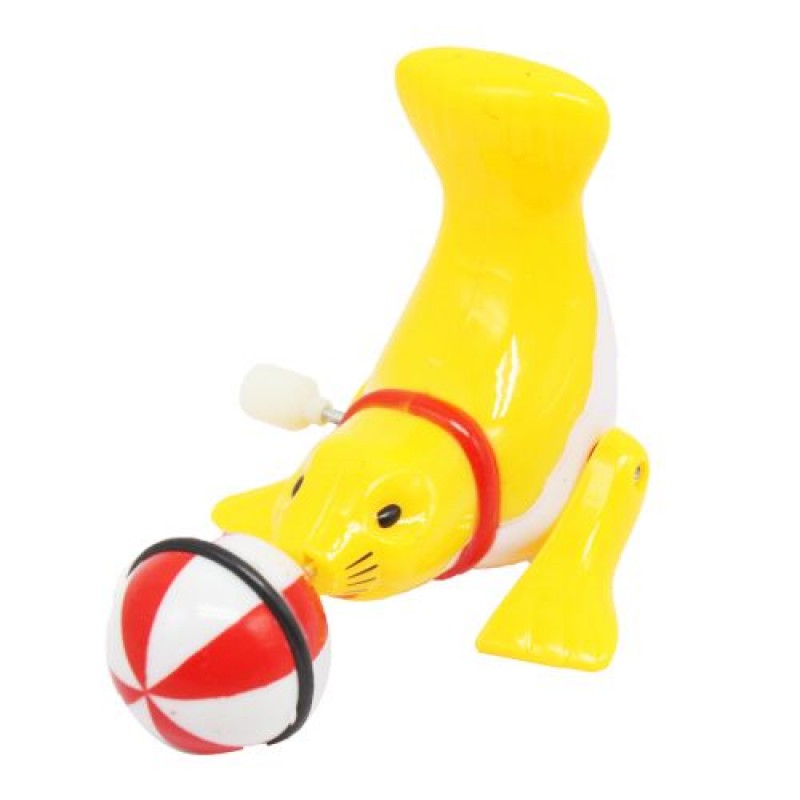 Заводна іграшка "Тюлень з мʼячиком", жовта Пластик Жовтий (207525)